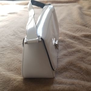 Saks fifth avenue white handbag with silver detail